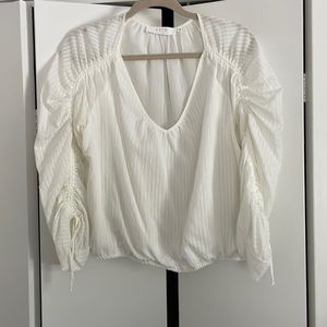White blouse with tie sleeves